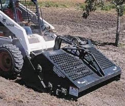 rent a skid steer and rockhound|rock rake for skid steer rental.